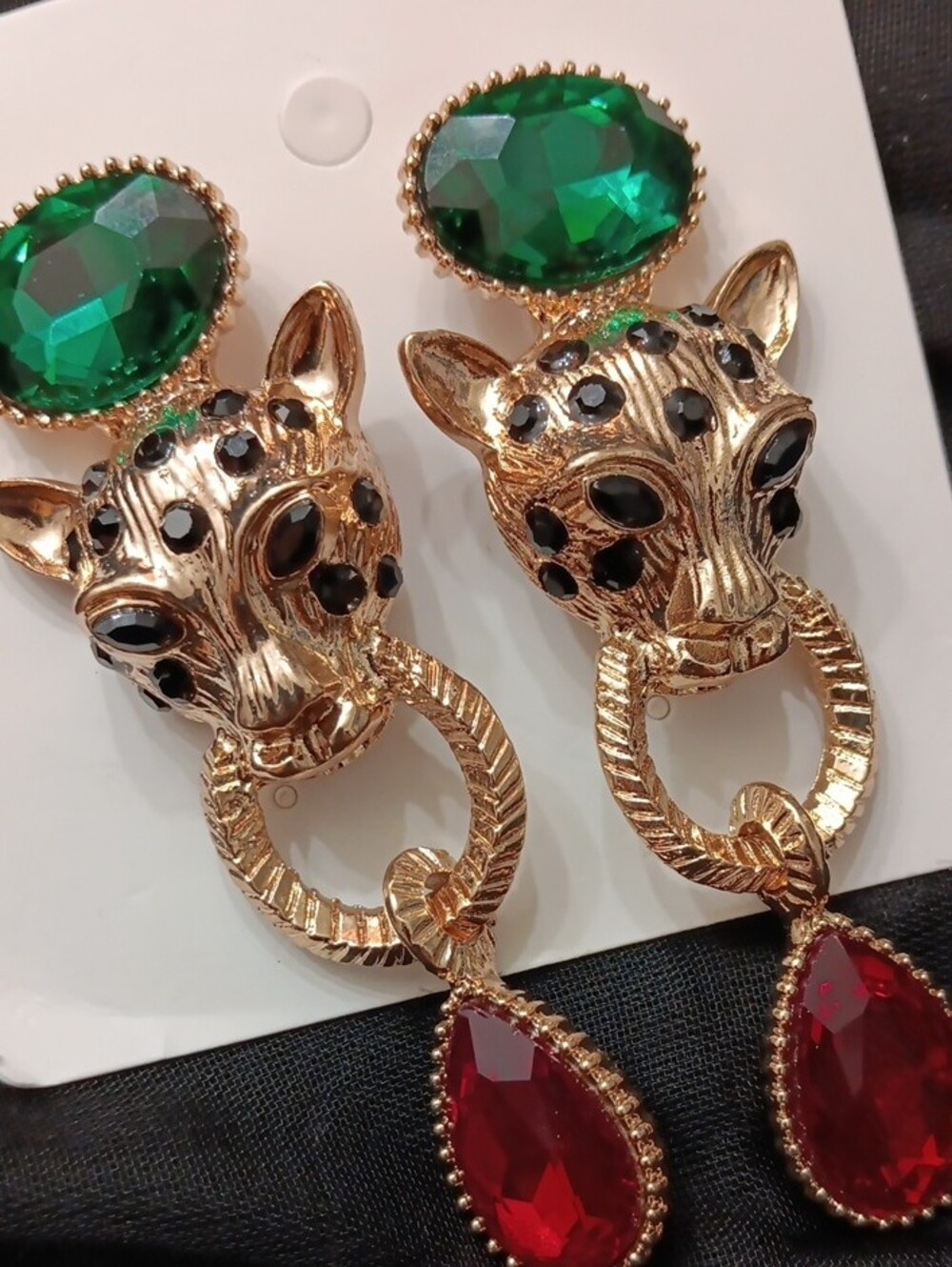 Gold-tone Leopard Head Earrings with Green and Red Stones